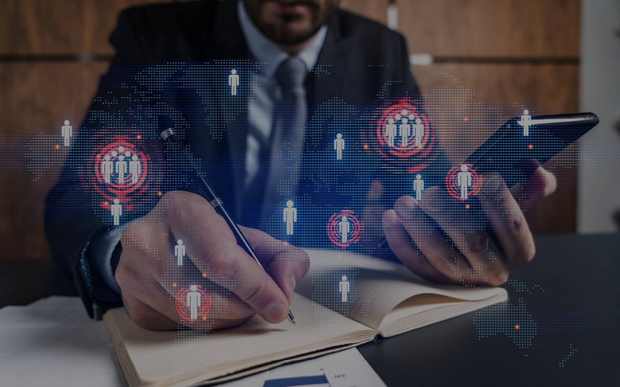 digital transformation in the workplace man writing in notepad smartphone graphic overlay world