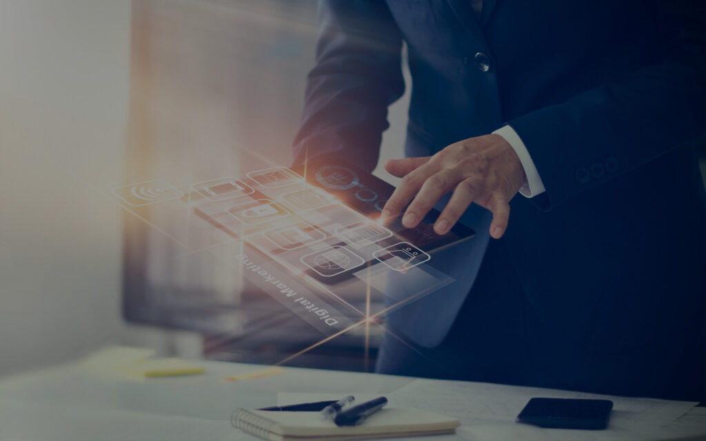 man in suit using tablet with data overlay