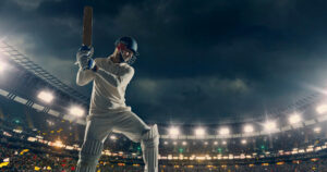 cricket player night stadium