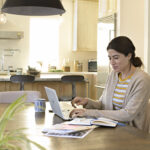 woman-working-from-home-remotely-hp-laptop